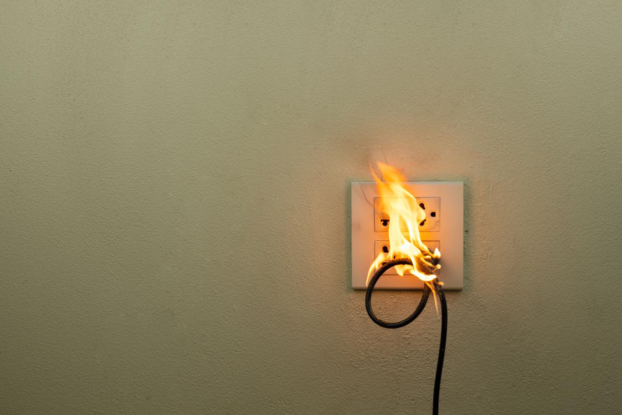 wire-and-outlet-on-fire-electrical-emergency