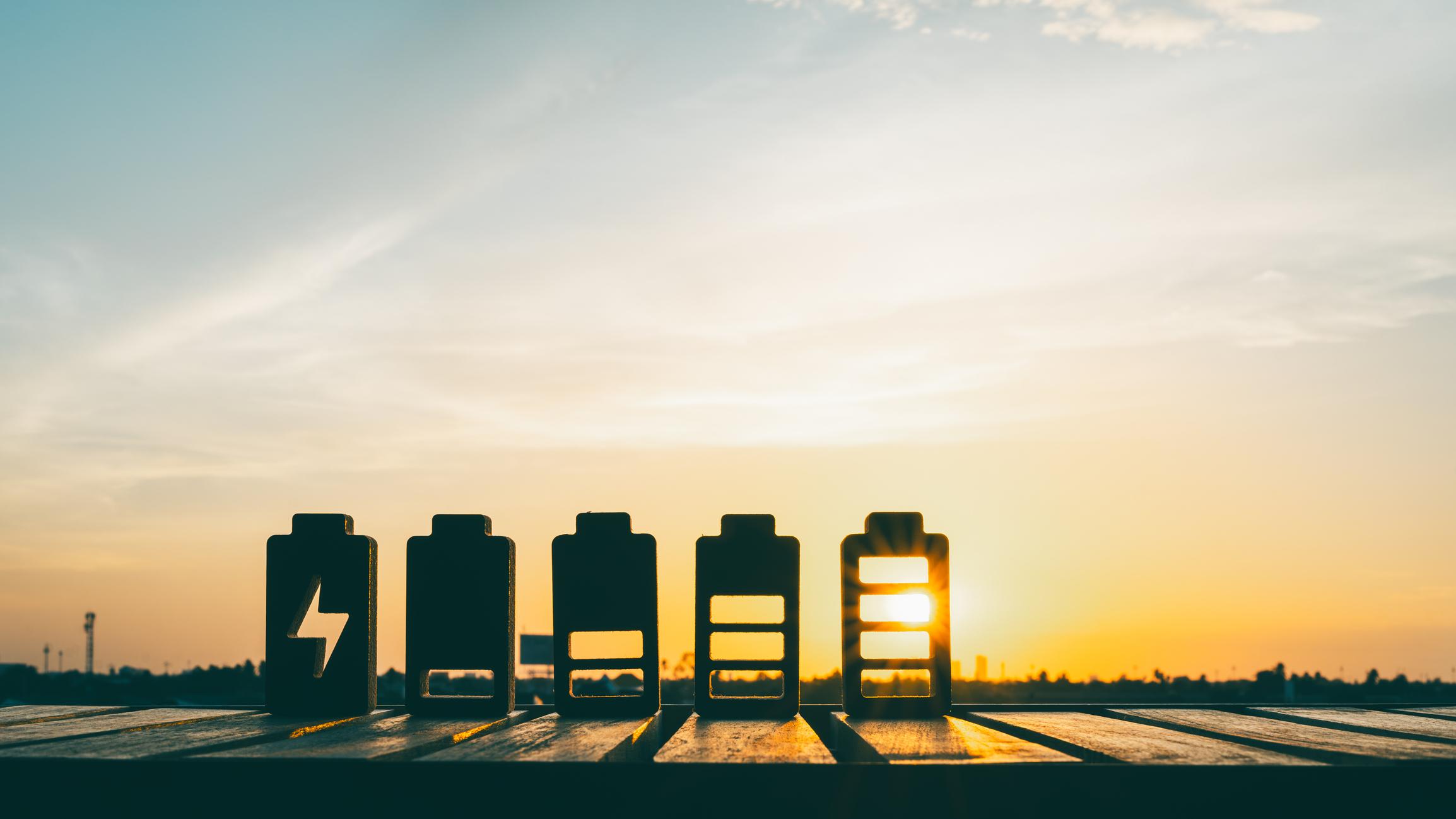 Battery charge indicator wood model. Phone charge level