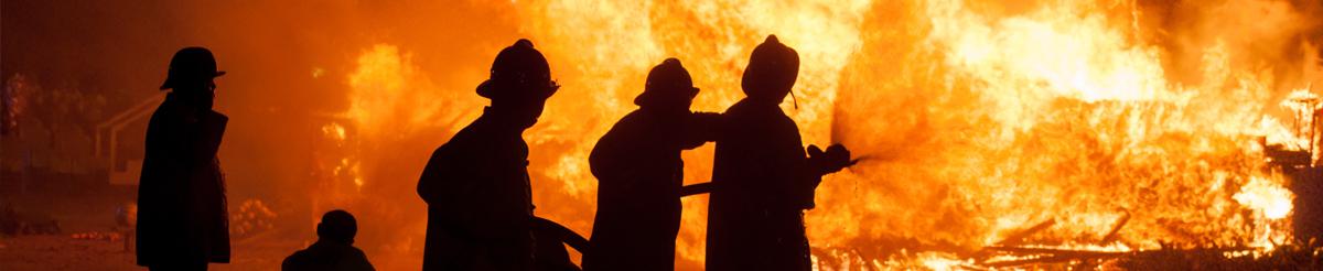 firefighters extinguishing fire