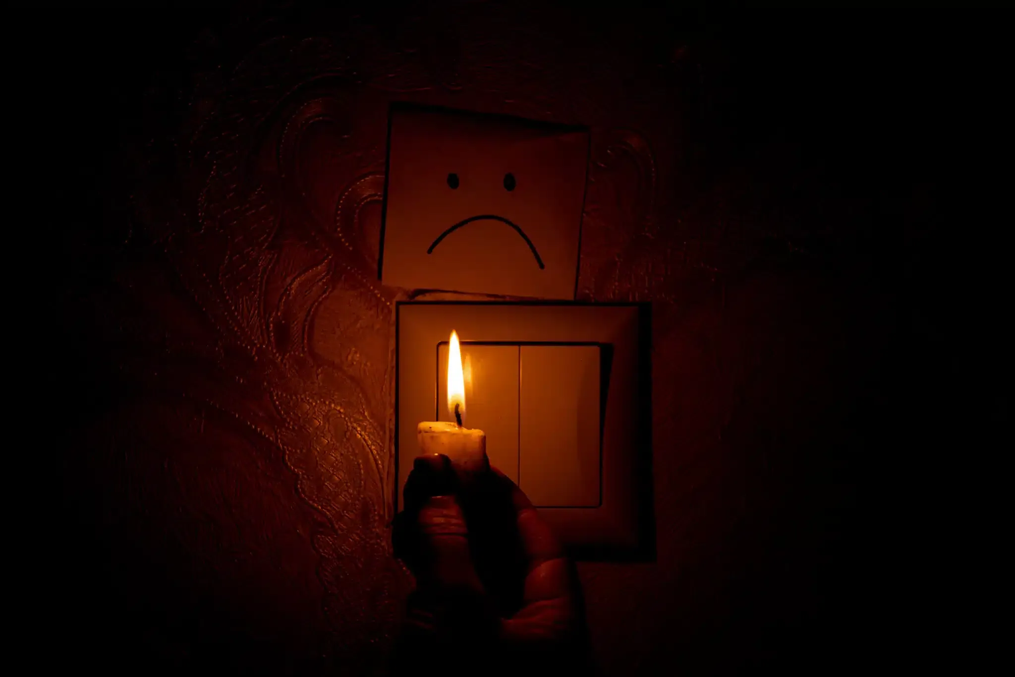 lighter showing light switch with frowny face on post it note