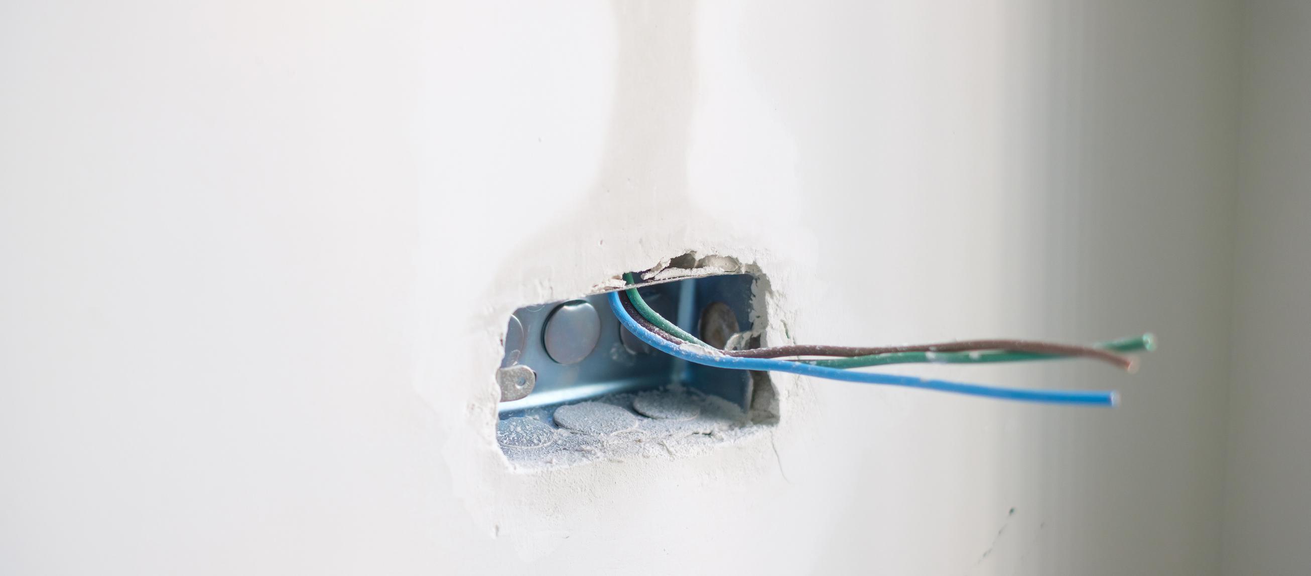 How to Run Wire Through Walls: Tools, Techniques, and When to Call a Pro