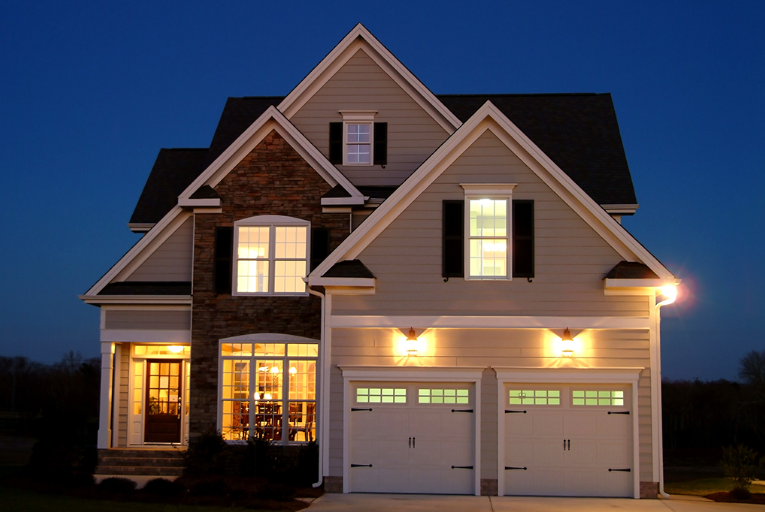 well lit two story home