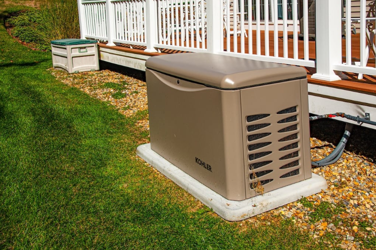 Outdoor generator next to deck