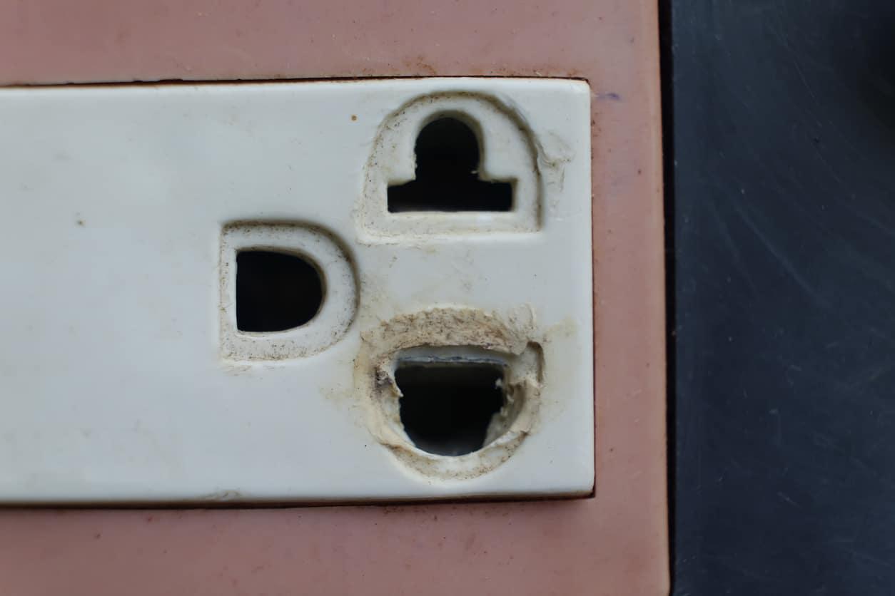 outlet with burnt holes