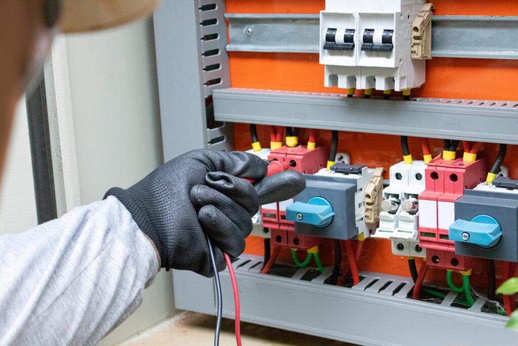 hand plugging in wire